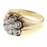 A seven stone diamond cluster ring totalling approx 0.70ct, marked 14k, 5.