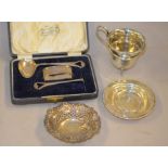 A cased silver three piece christening set 'Man in the Moon' H/M Birmingham 1929,