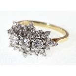 An diamond cluster ring, marked 14-18k, approx total diamond weight 1.