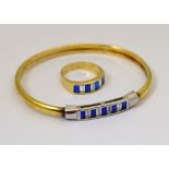 A matching ring and hollow bangle set with blue and white stones, marked 585, together approx 13.