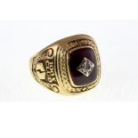 An American college ring set with a central Diamond, marked only JOSTEN probably 10ct, approx 18.