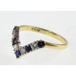 An 18ct H/M sapphire & diamond wishbone ring,