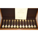 A set of 12 silver 'RSPB spoon collection', spoons in fixed wooden case, H/M London 1975,