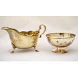 A silver sauce boat H/M Sheffield 1937 together with a plain silver sugar bowl H/M Sheffield 1967,