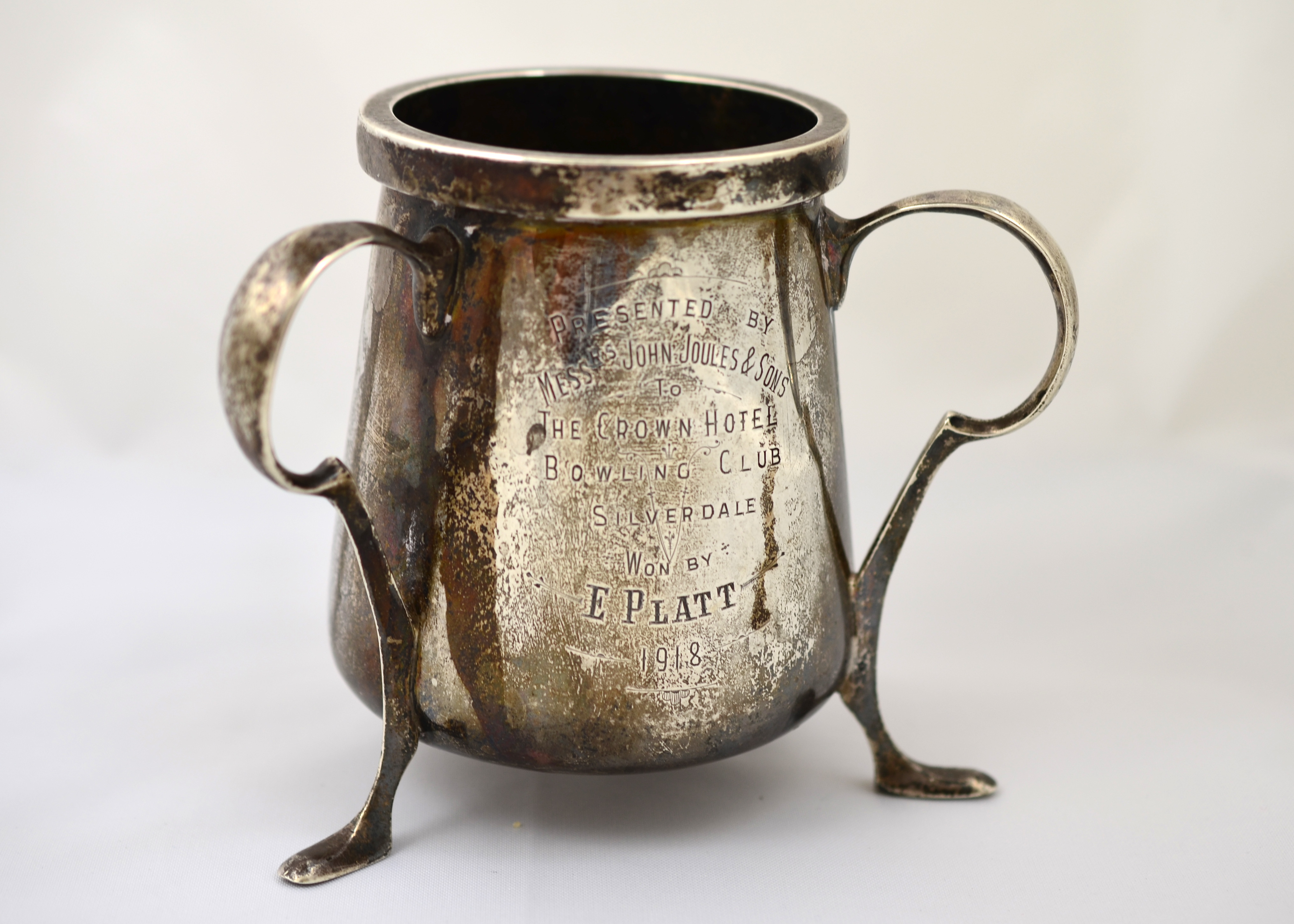 A Silver Arts & Crafts three-handled cup by A & J Zimmerman, Hallmarked Birmingham 1907,