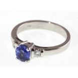 An 18ct H/M sapphire & diamond three stone ring, approx 4.