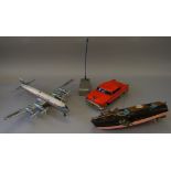 Masudaya remote control car together with a Yoshida aeroplane and a wooden boat (3)