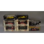 8 1:18 models including Bburago, Hotwheels and Minichamps, boxed.