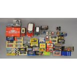 Quantity of assorted boxed diecast including AutoArt and Corgi examples.