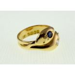 An 18ct Diamond & Sapphire set snake rin