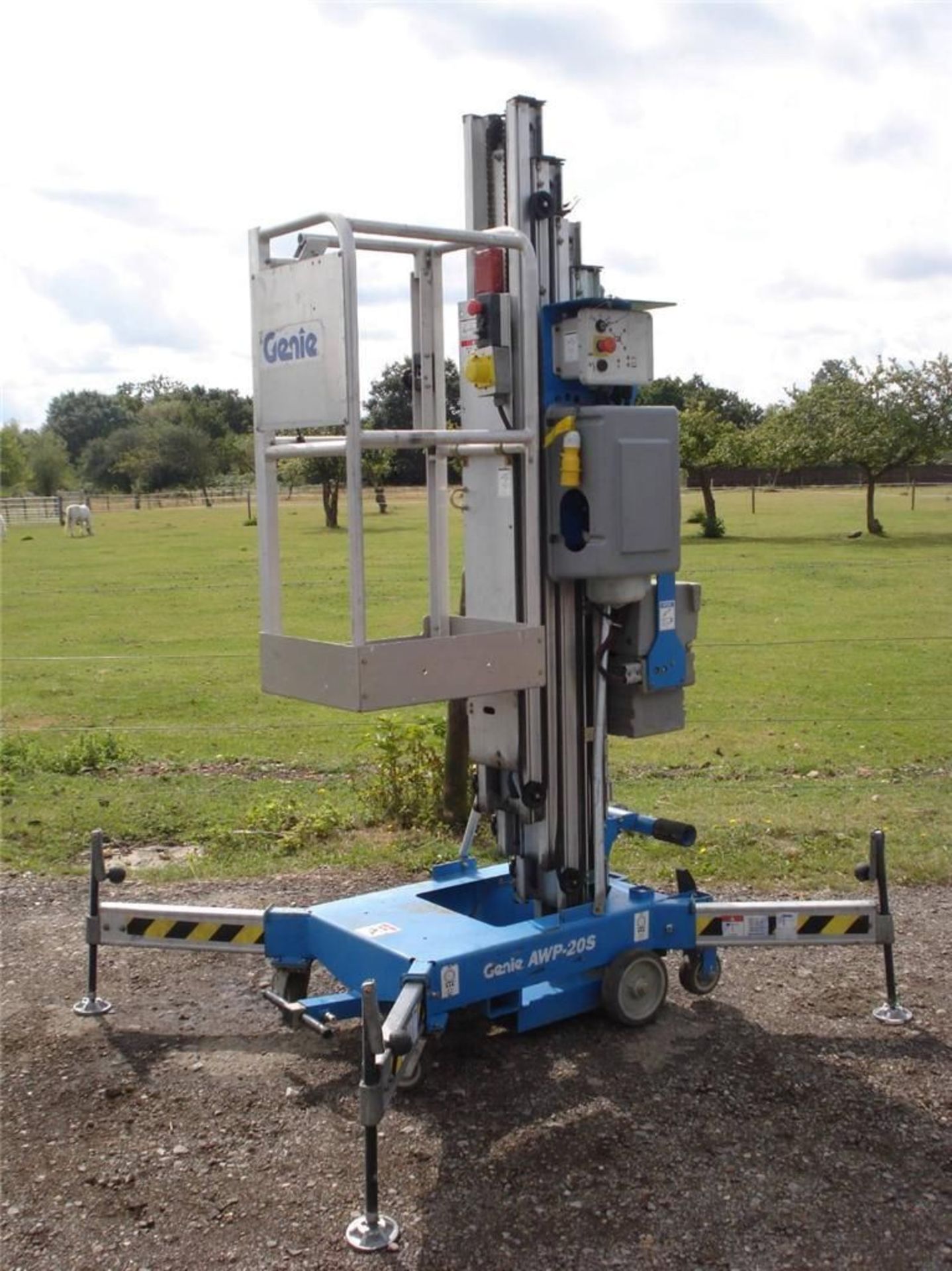 Genie AWP 20S standard base personnel access hoist unit with narrow guage cage.