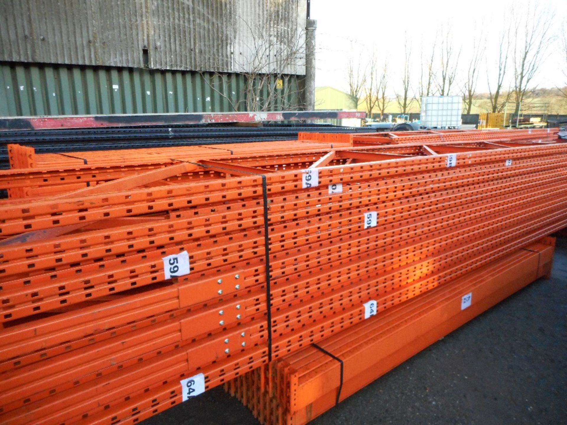 Large quantity of orange pallet racking plus beams