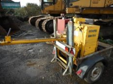 Bomag BW75 single drum handle start roller on trailer.