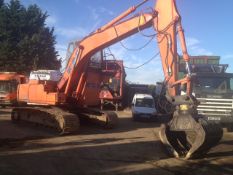 Hitachi EX215 high cab scrap handler