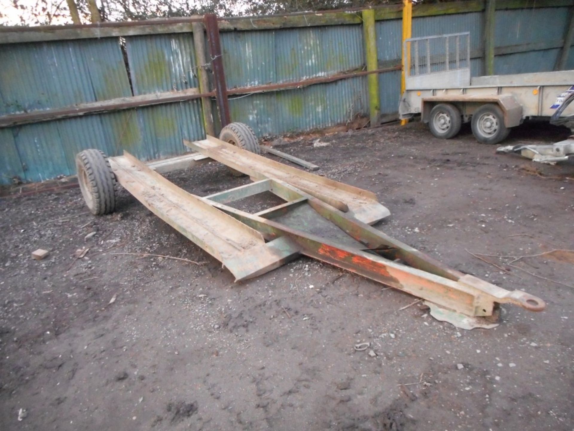 Single axled low loader trailer for farm use