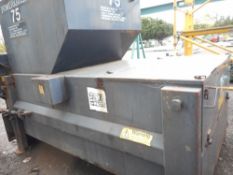 Powerkrush 75 hook bin waste compactor unit.