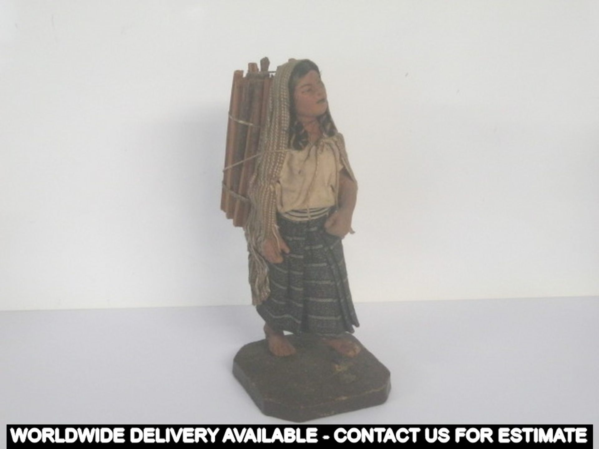 Eastern lady figure carrying wood