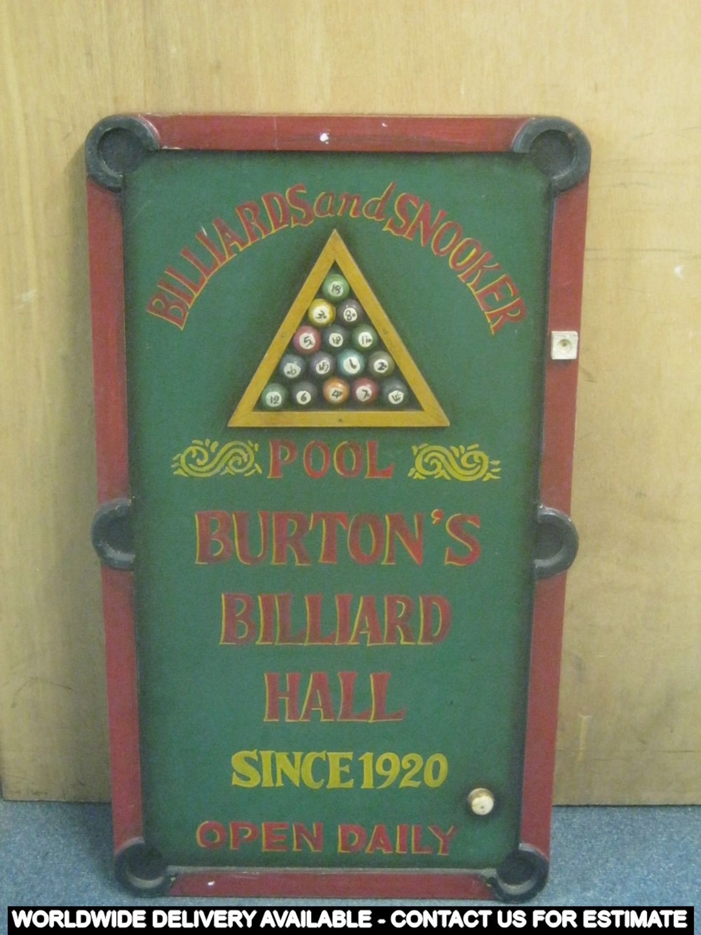 A wooden relief "Billiards and Snooker" sign