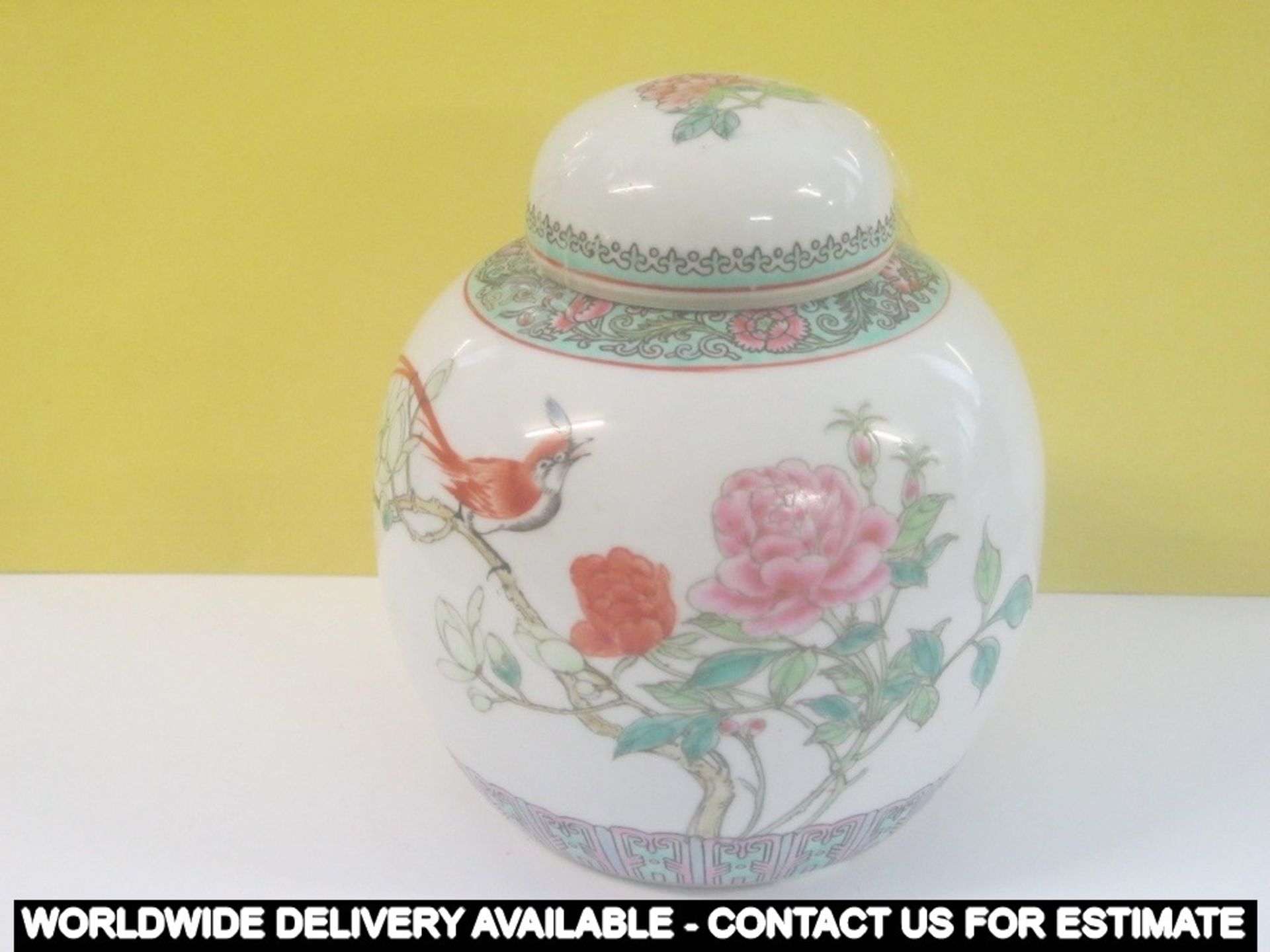 Ginger jar decorated with flowers and bird