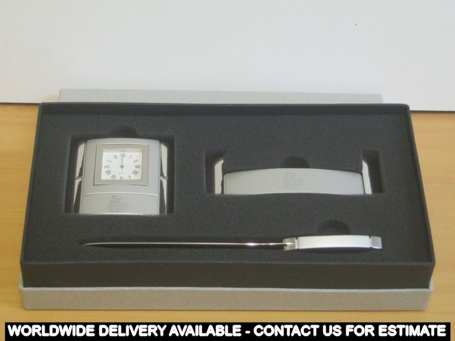 Quartz desk clock with letter opener in box