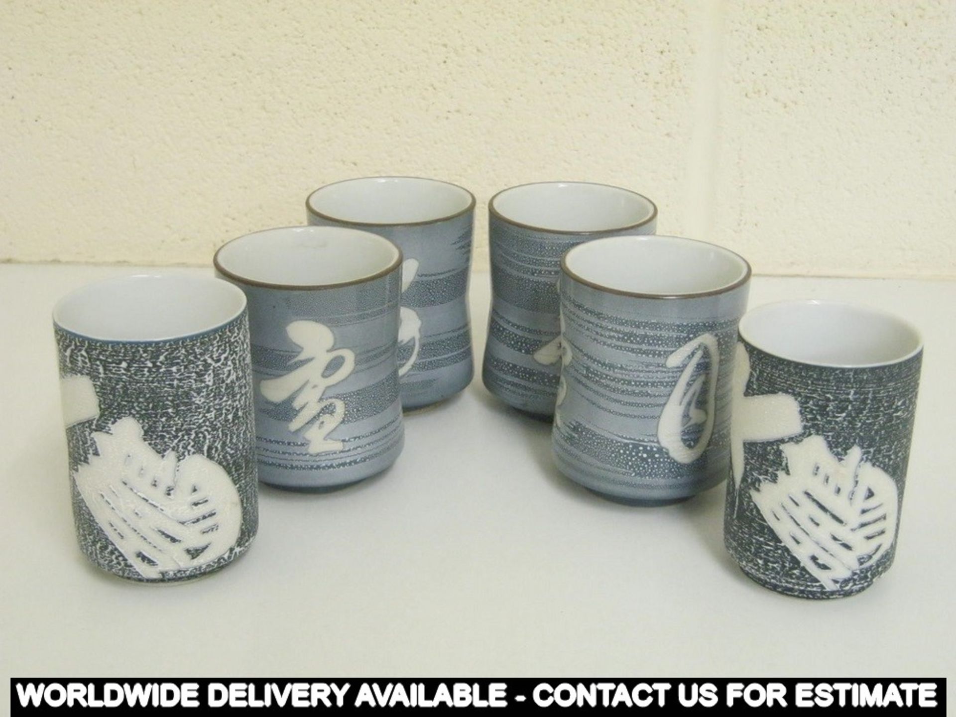 Six oriental drinking cups