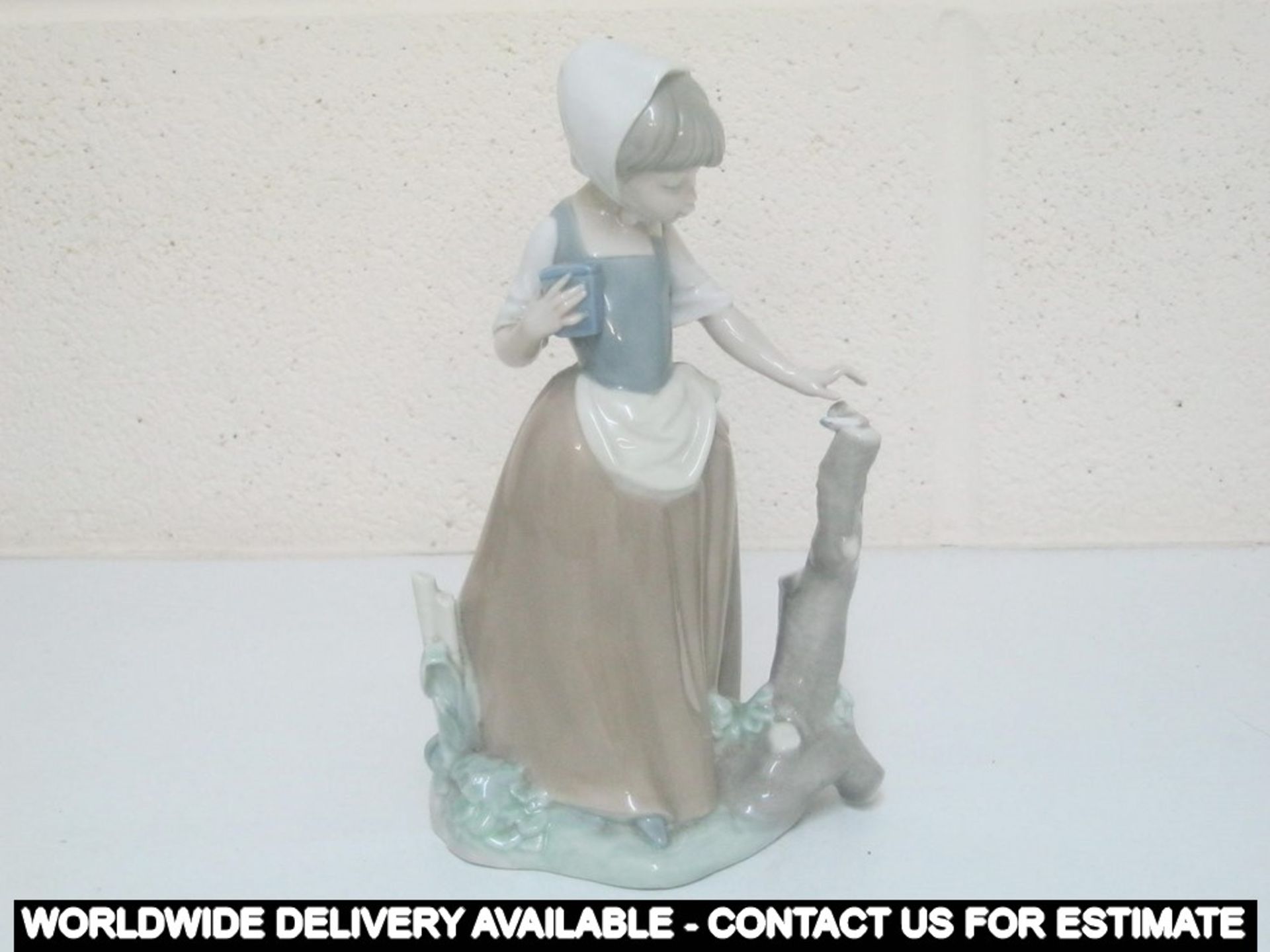 Lladro NAO - girl with butterfly