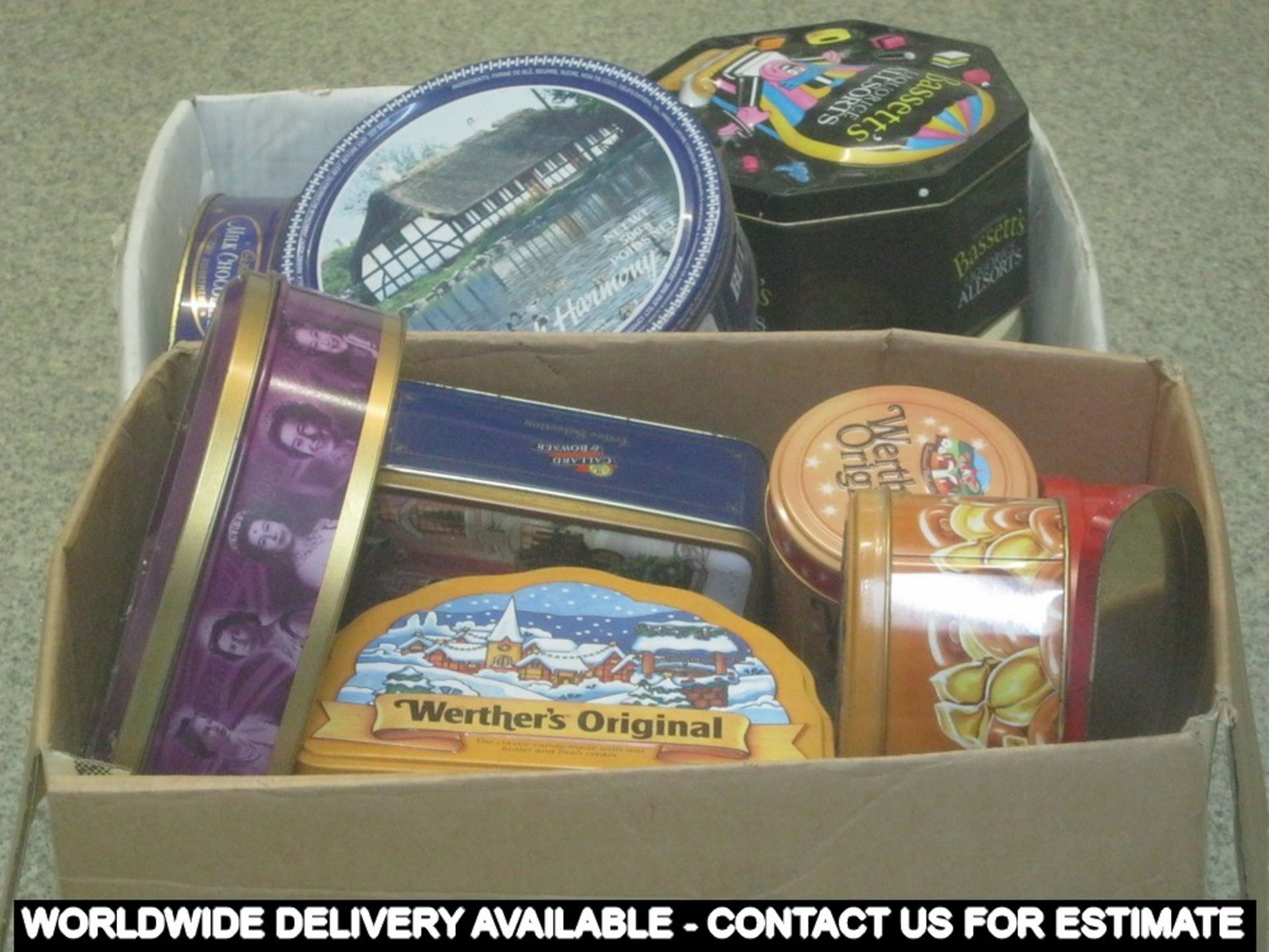 Two boxes of tins (qty 18)