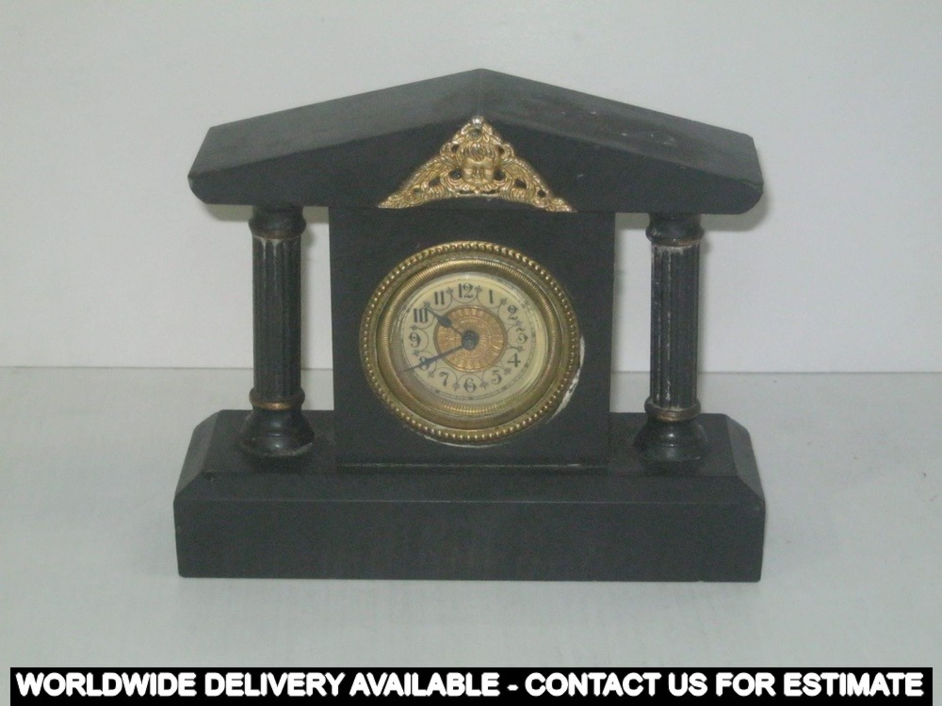 A black marble clock