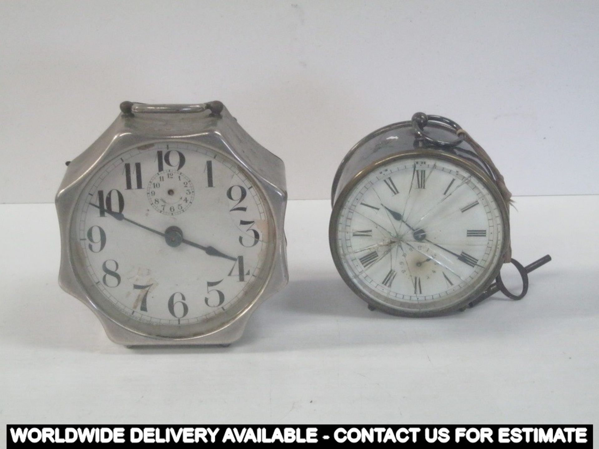 Two clocks - one 13cms high approximately and the other 10cms high approximately   AF