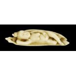 DOCTOR`S LADY  Far East, 19th century. Carving in dentin pictures naked woman body lying on a foliar
