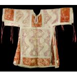 COURT DRESS  Far East, 17th / 18th century. Ostentatious upper dress of surcoat type of rough cotton
