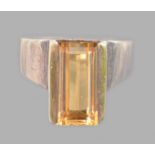 RING WITH CITRINE  Ring of silver and yellow gold set with citrine of baguette cut of the size 11,