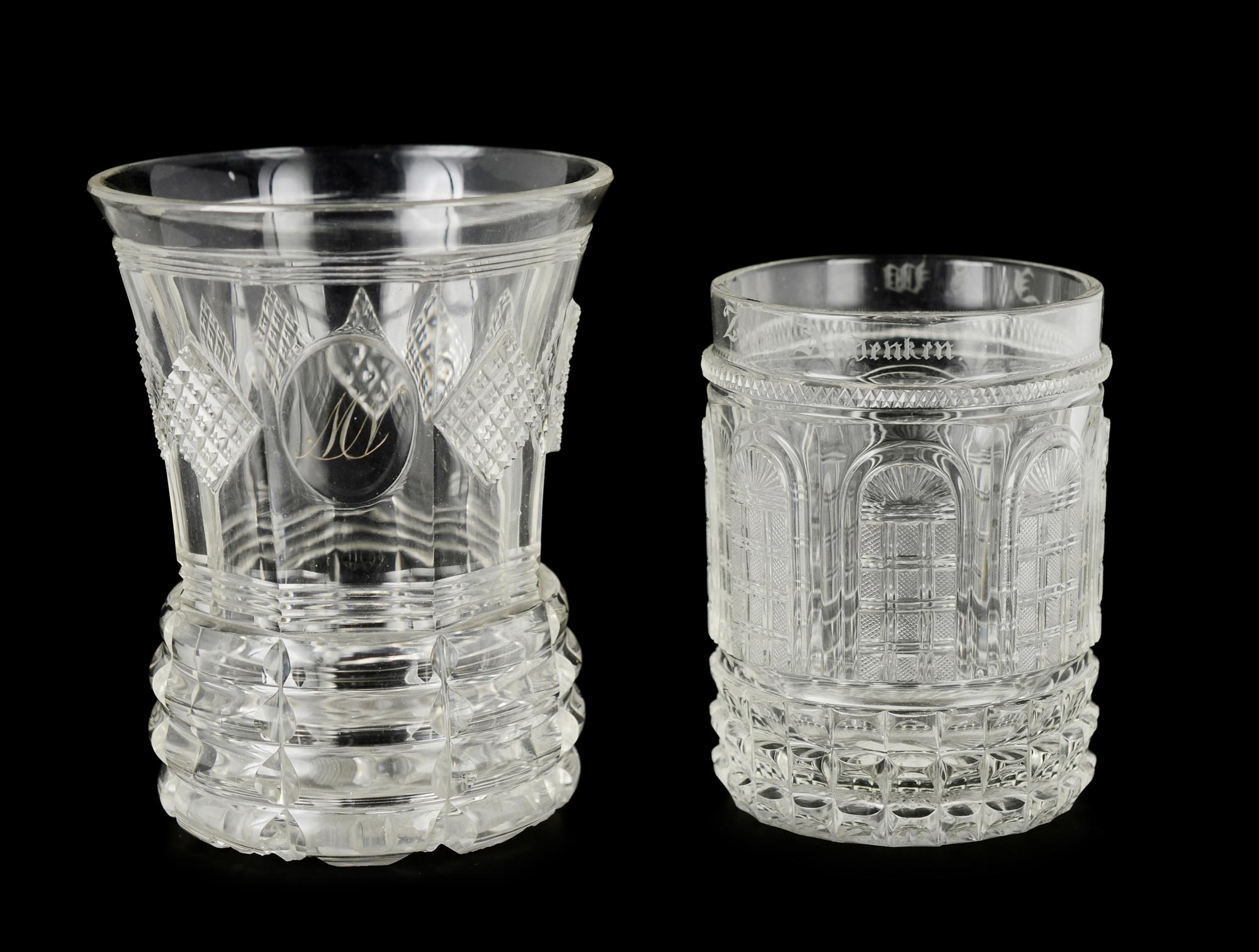 TWO GLASSES  Austria, Vienna, 1840s. Water glass made of clear glass is decorated all-over with