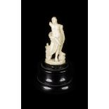 FIGURAL MINIATURE  18th century. Precise carving in bone depicting Apollo, the god of sun, partly