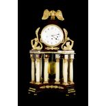 CLOCK WITH EAGLE  Austria, around 1820. Grandfather pendulum clock with spring mechanism. White