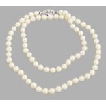 PEARL NECKLACE  String of 76 big regular white pearls with sliding fastening of white gold in the
