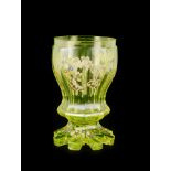 GOBLET URANIUM GLASS  Bohemia, half 19th century. Bell-shaped goblet made of mould blow glass of