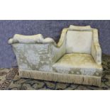 A late Victorian/Edwardian two seat conversation/love seat, with square backs,  upholstered in old