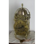 A late 19th / early 20th Century brass cased ‘Lantern’ style clock by Winterhalter and