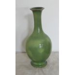 A Chinese celadon glazed porcelain bulbous vase, 13ins high (with blue six character mark to base –