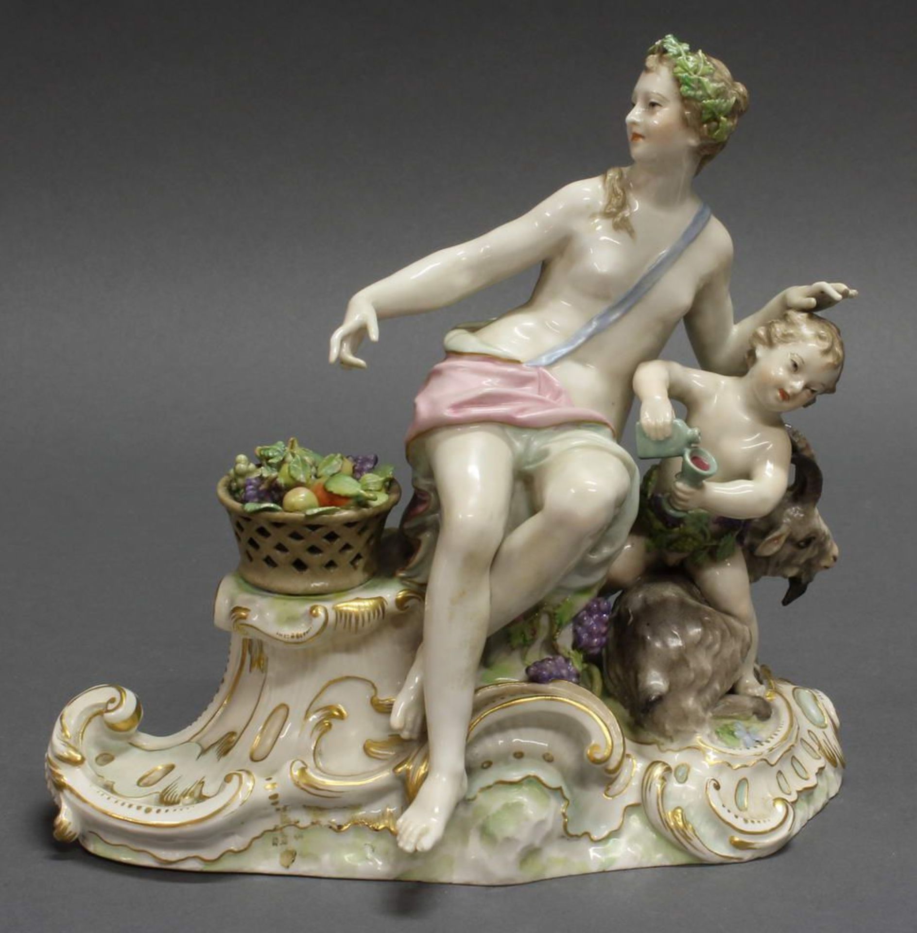 Reserve: 200 EUR        Porzellangruppe, "Bacchantin mit Putto und Ziegenbock", KPM Berlin, blaue