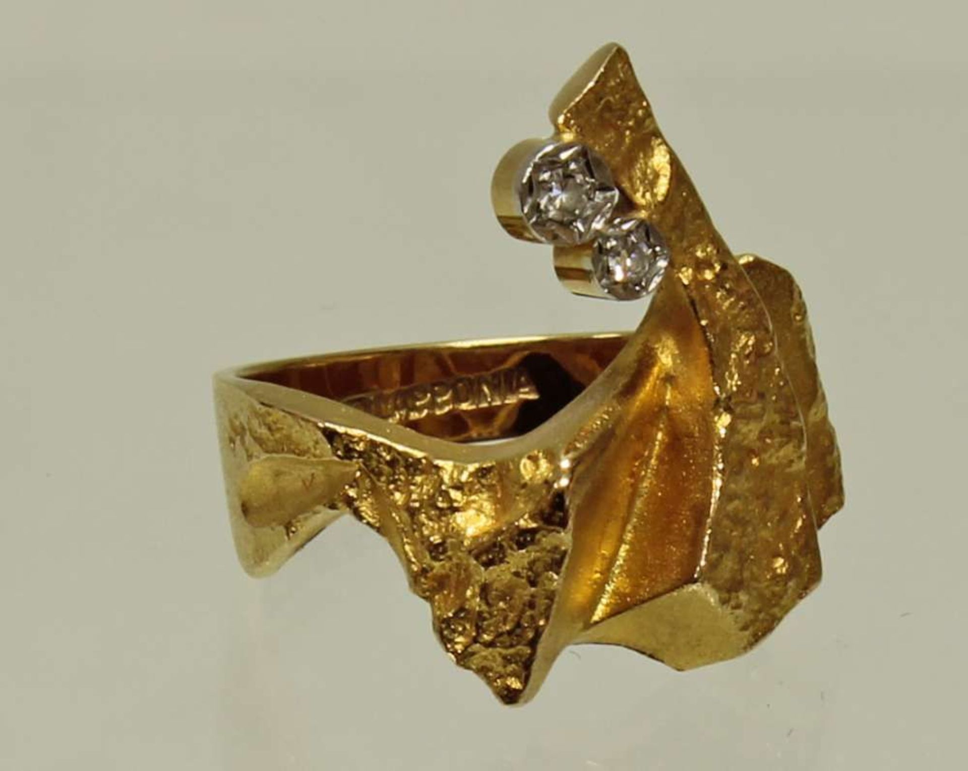 Reserve: 200 EUR        Ring, gepunzt Lapponia (Finnland), GG 750, 2 Diamanten zus. ca. 0.03 ct.,