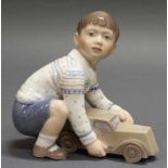 Reserve: 100 EUR        Porzellanfigur, "Junge mit Spielauto", Dahl-Jensen, Kopenhagen, Modellnummer