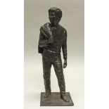 Reserve: 360 EUR        Bronze, "Junger Mann mit Jacke", auf der Plinthe bezeichnet Ronzano, 3/12,