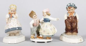 3 Figuren Porzellan, Royal Dux/Ens, 1.H.20.Jh. Vollplastische Kinderfiguren, polychr. staffiert.