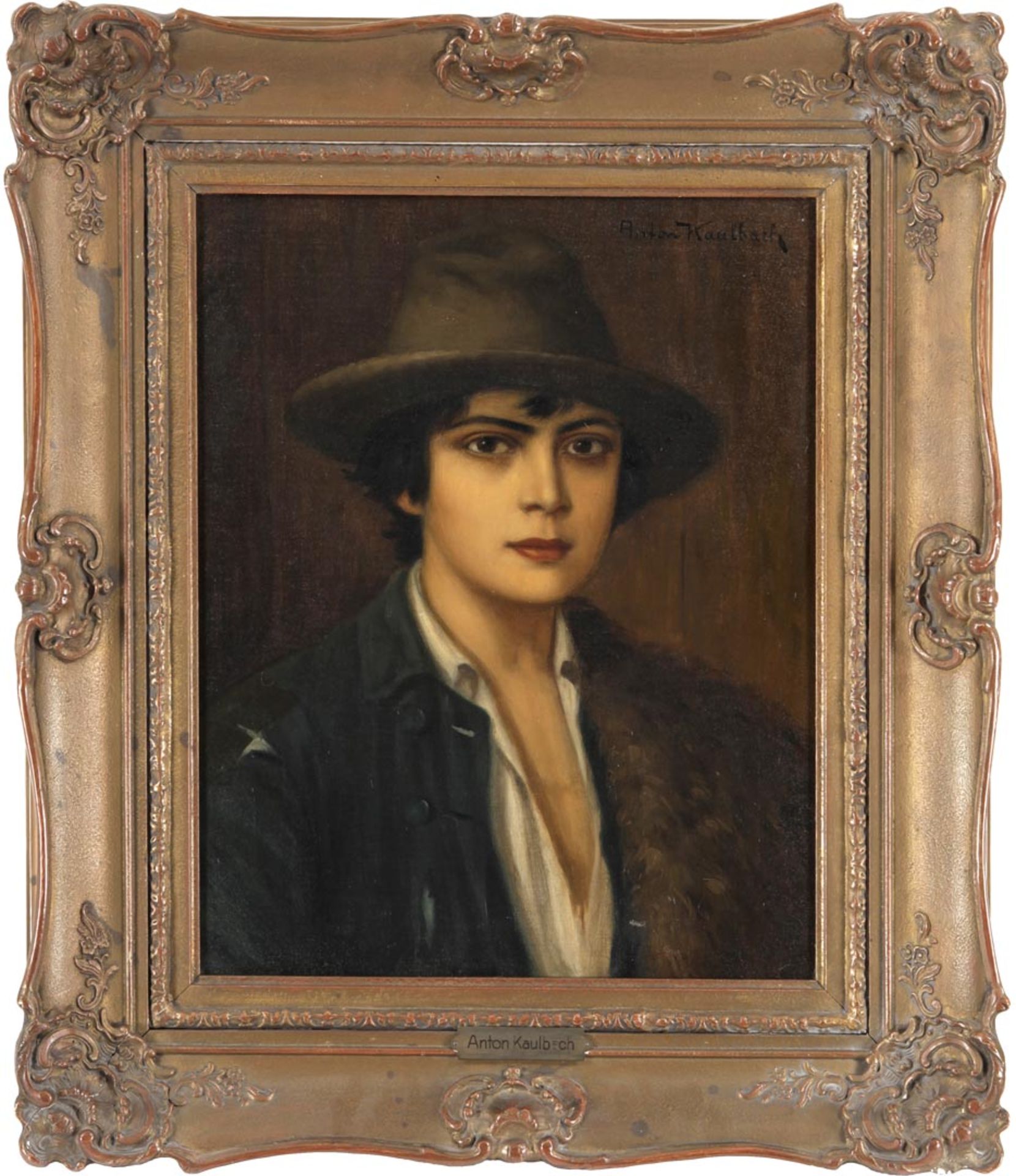Kaulbach, Anton 1864 Hannover - 1930 Berlin Portrait einer jungen Frau als Knabe, m. Hut u. Fell