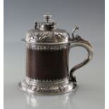 Tankard Silver and plum wood, elaborated and densely decorated stand and lid, underneath and