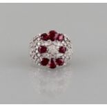 Ring 18ct. white gold, jewelled with eight tear shaped rubies of good quality, total 3.15 ct. and 85