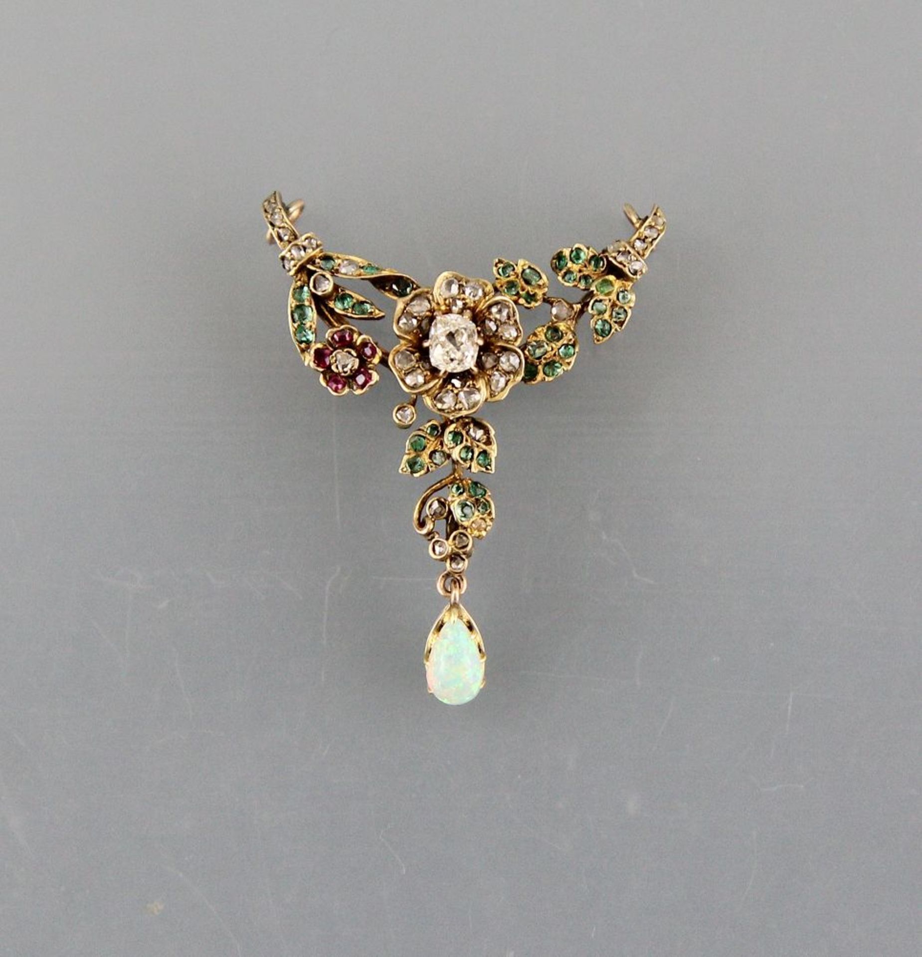 Pendant 14ct. yellow gold with diamond roses, rubies and emeralds, attached small opal, 30 x 38