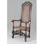 William & Mary armchair Turned and carved walnut with cane seat and back, h. 140 cm, w. 65 cm,